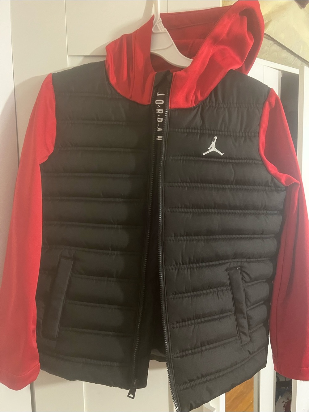 NWOT Jordan Kids Black Puffer Jacket with Red Hoodie Sleeves